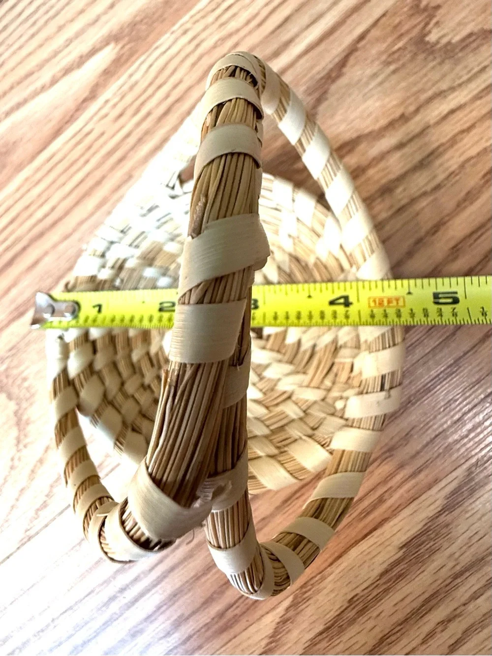 Atraditional hand-woven sweetgrass basket